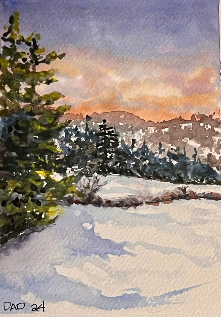 Watercolor painting of a winter landscape featuring snow-covered ground and evergreen trees against a colorful sunset sky.