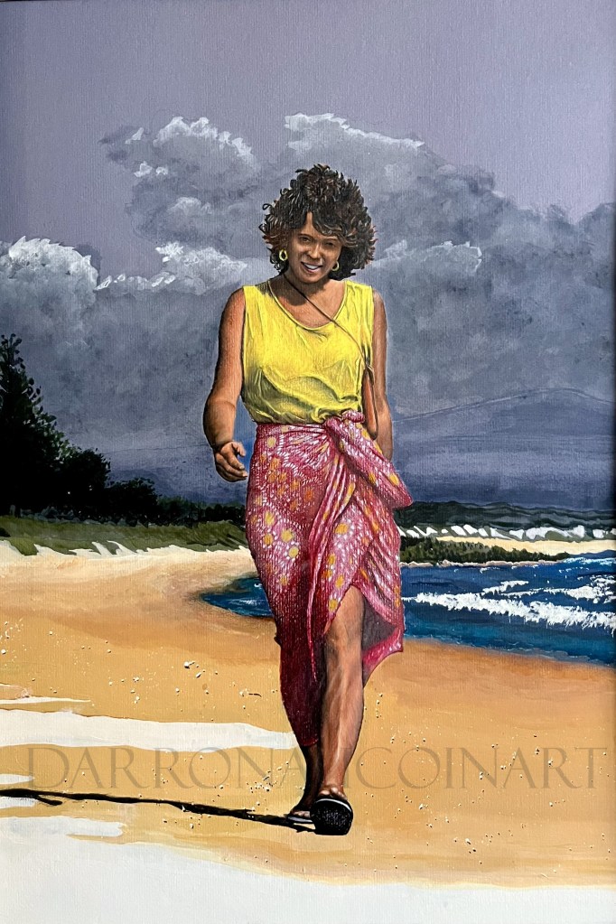 A woman walking along a beach, wearing a yellow top and a colorful sarong, with a joyful expression. The background features a sandy shore and rolling waves under a cloudy sky.
