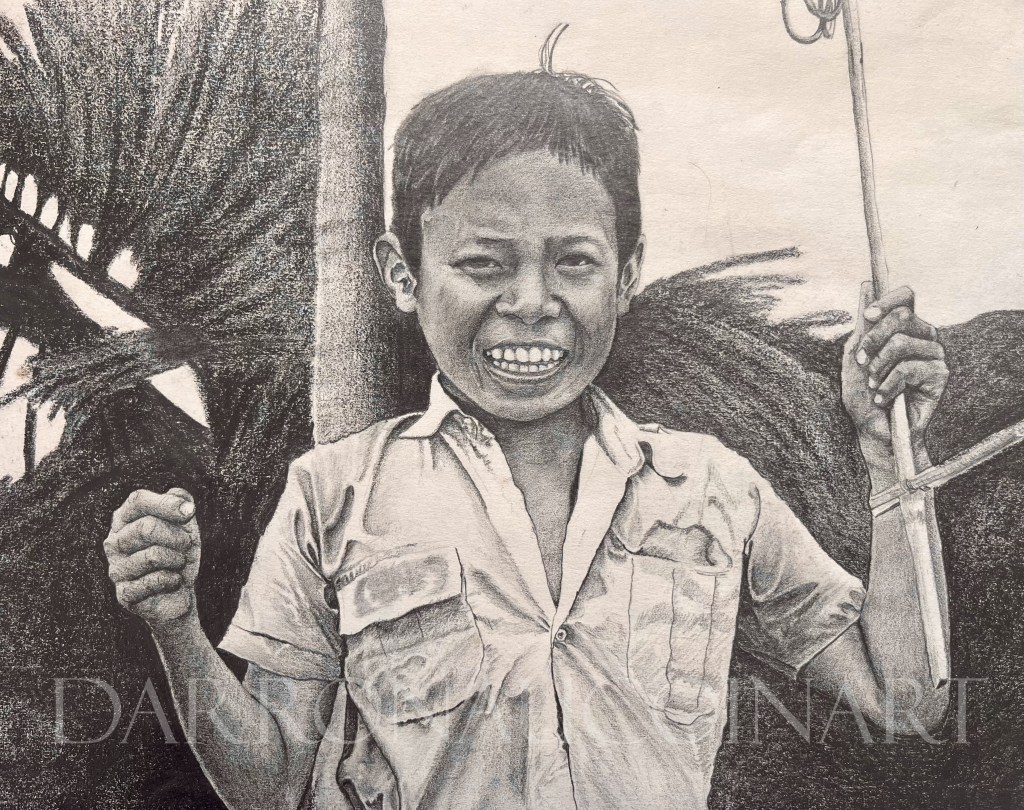 A joyful portrait of a young boy smiling widely while holding a stick, surrounded by lush foliage.